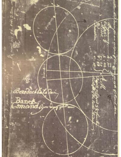 Scanned copy of a cover of a text by Benjamin Banneker depicting several circles and assorted penned text