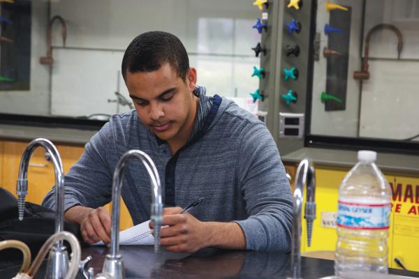 Image of student working in a science lab